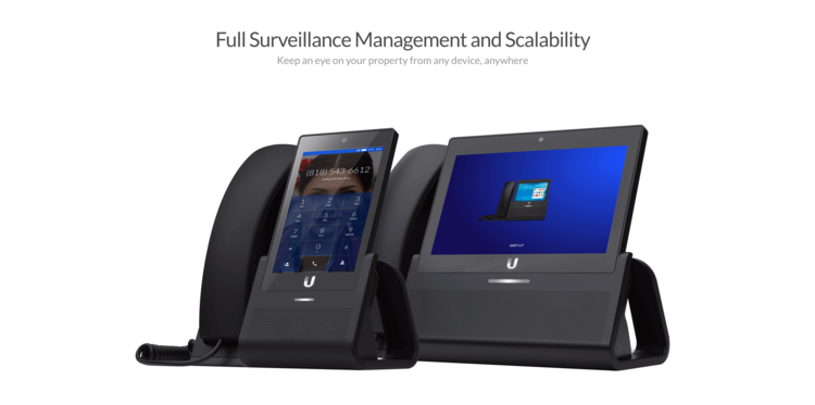 Two digital devices on stands, showcasing screens with user interfaces and promotional text.